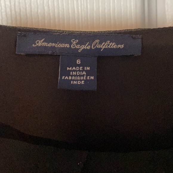 Black ae peephole dress. Super flattering. - Picture 3 of 5